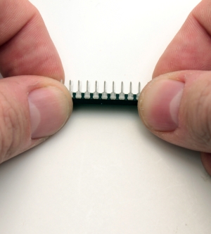 Carefully bend the legs of the MCP23017 IO Expander